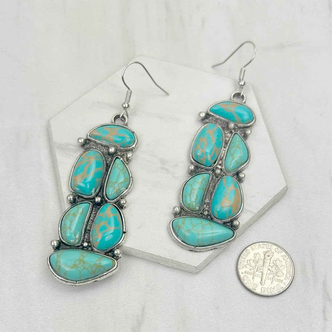 ER0240715-01 Silver metal with light blue tur.